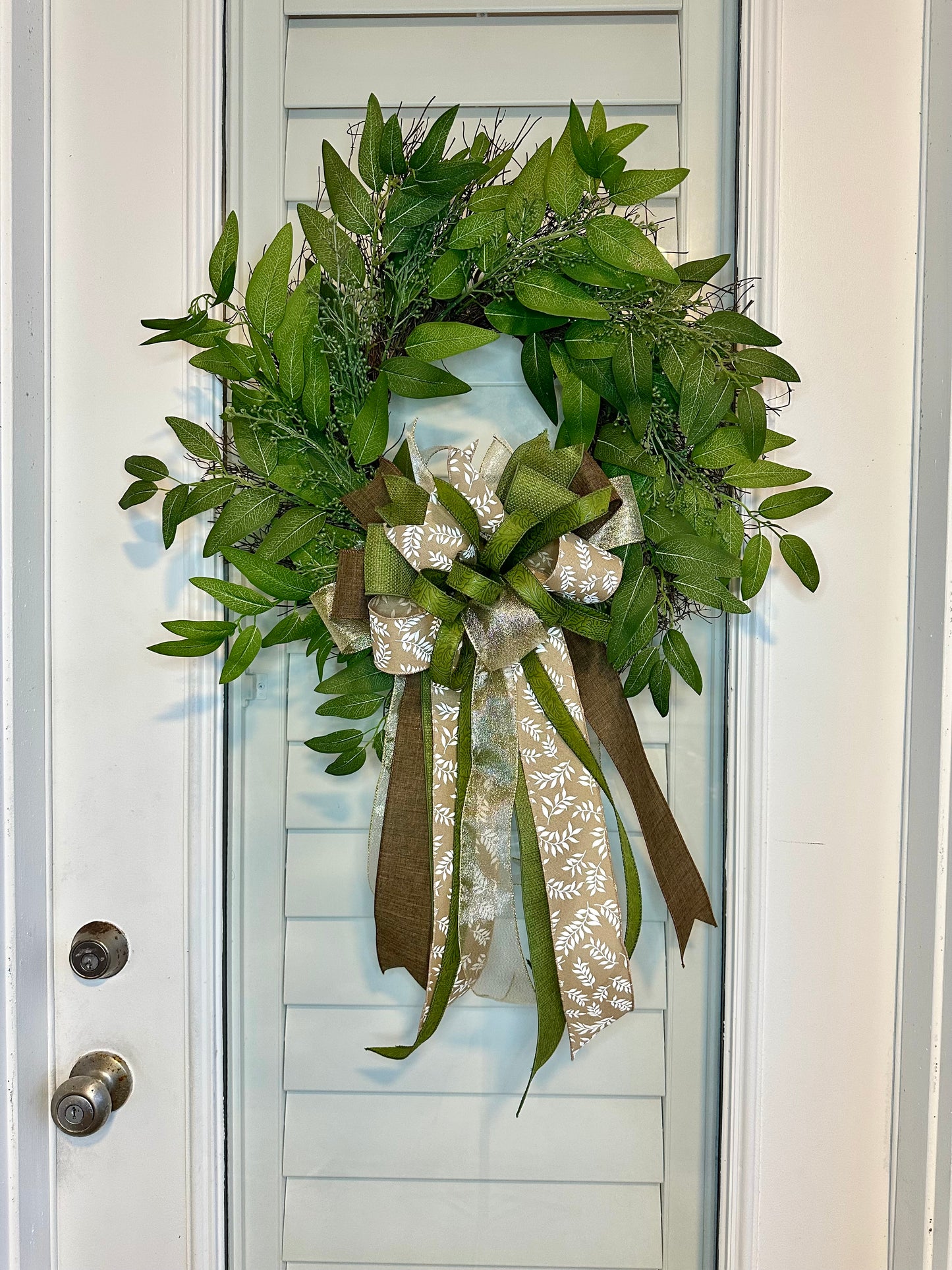 Green Eucalyptus Wreath earthy tones of mocha, burlap, and moss in the ribbon